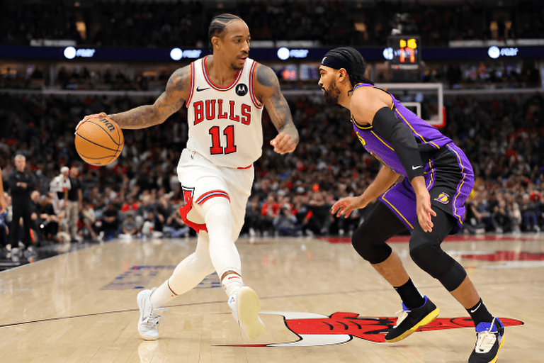 DeMar DeRozan #11 of the Chicago Bulls drives to the basket against Gabe Vincent #7 of the Los Angeles Lakers during the second half at the United Center on December 20, 2023 in Chicago, Illinois.