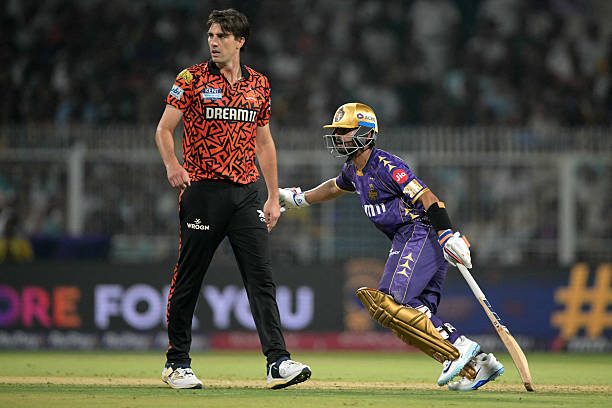 SRH vs KKR Dream11 Prediction: Kolkata Knight Riders' captain Ajinkya Rahane (R) runs between the wickets past Sunrisers Hyderabad's captain Pat Cummins during the Indian Premier League (IPL) Twenty20 cricket match between Kolkata Knigt.