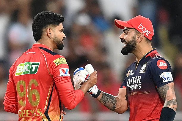 PBKS vs RCB Qualifier 1: Royal Challengers Bengaluru's Virat Kohli (R) is congratulated by Punjab Kings' captain Shreyas Iyer after their win.