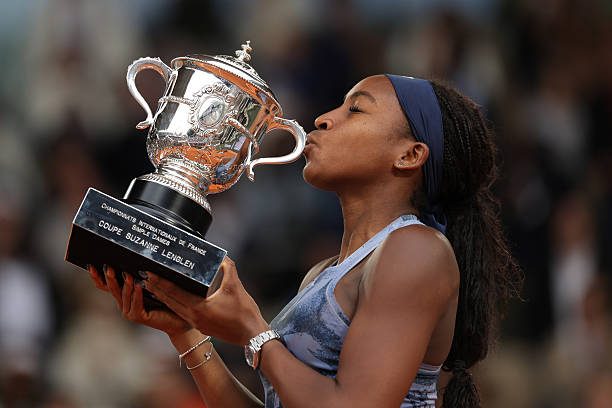 Coco Gauff wins French Open 2025 women's singles showing her trophy.
