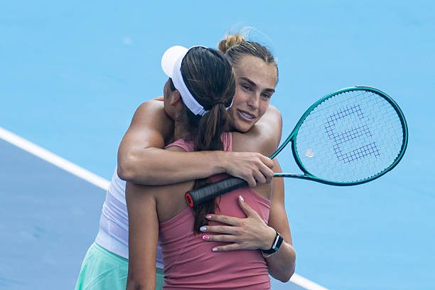 Aryna Sabalenka of Belarus embraces Emma Raducanu of Great Britain in Cincinnati Open 2025.