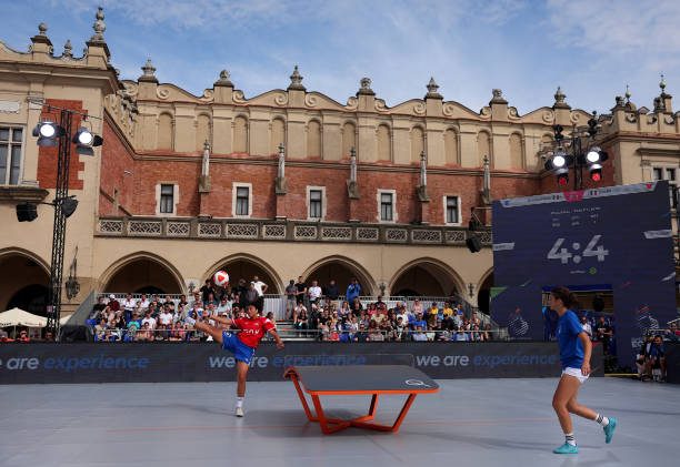 Two players playing unusual sport Teqball.