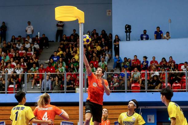 People playing unique sports Korfball.