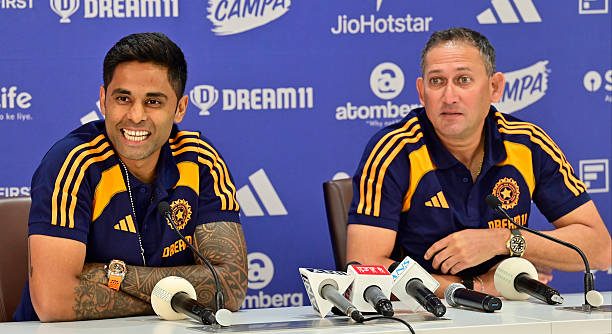 Surya Kumar Yadav with ajit Agargar after Asia Cup 2025 teams announcing moment.