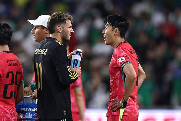 Santiago Gimenez and Son Heung-min greet after Mexico vs South Korea match.