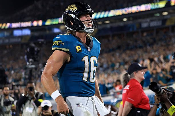 Trevor Lawrence celebrates after touchdown in Jaguars vs Chiefs match.