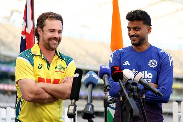 Travis Head and Axar Patel before the IND vs AUS ODI 2025.
