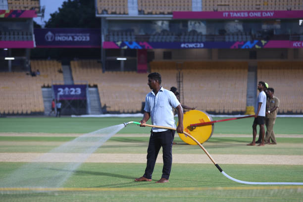 Grounds staff work on the preparing the MA Chidambaram  pitch. 