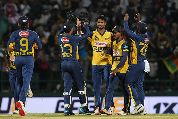 Matheesha Pathirana (C) of Sri Lanka. 